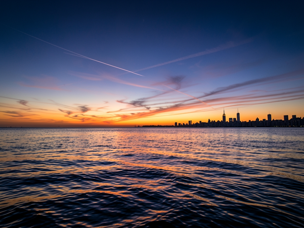 dramatic twilight over Atlantic Ocean transitions from deep