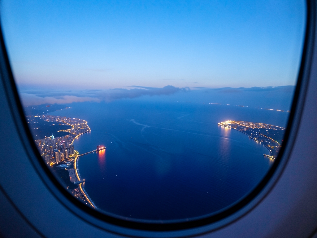 Twilight view from high altitude window showing curve Atlantic
