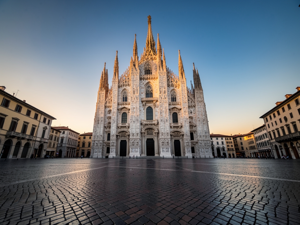 Elegant Milan plaza with gothic marble cathedral warm