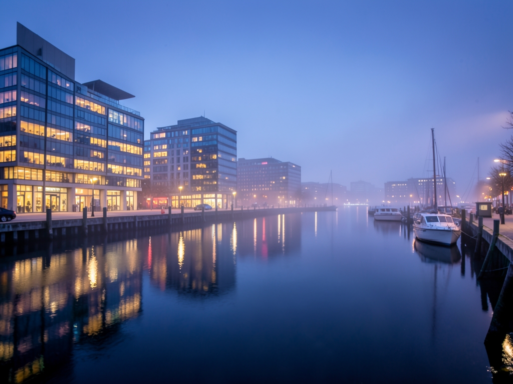 Wide angle view Copenhagen harbor twilight with calm waters