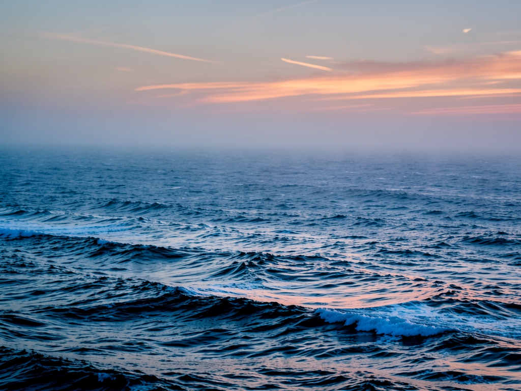 misty twilight scene over vast Atlantic Ocean where