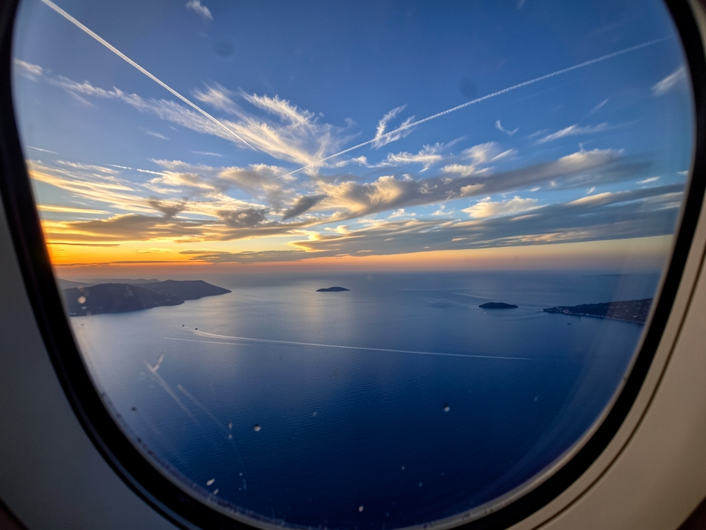 dusk view over Tyrrhenian coast from airplane window