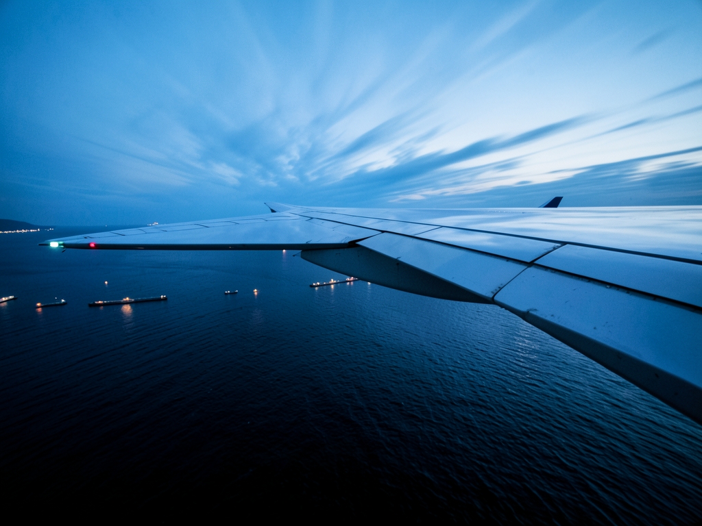 Overnight Atlantic crossing toward York airplane wing above