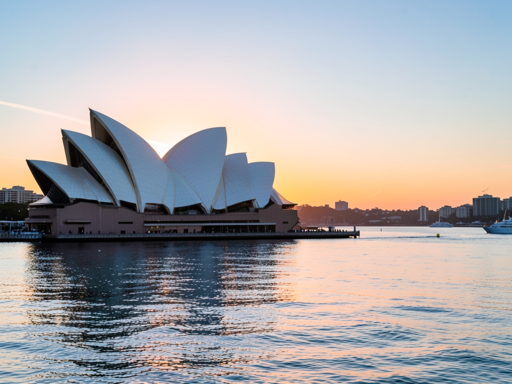 Sydney harbour sunrise with curved white shell rooftops