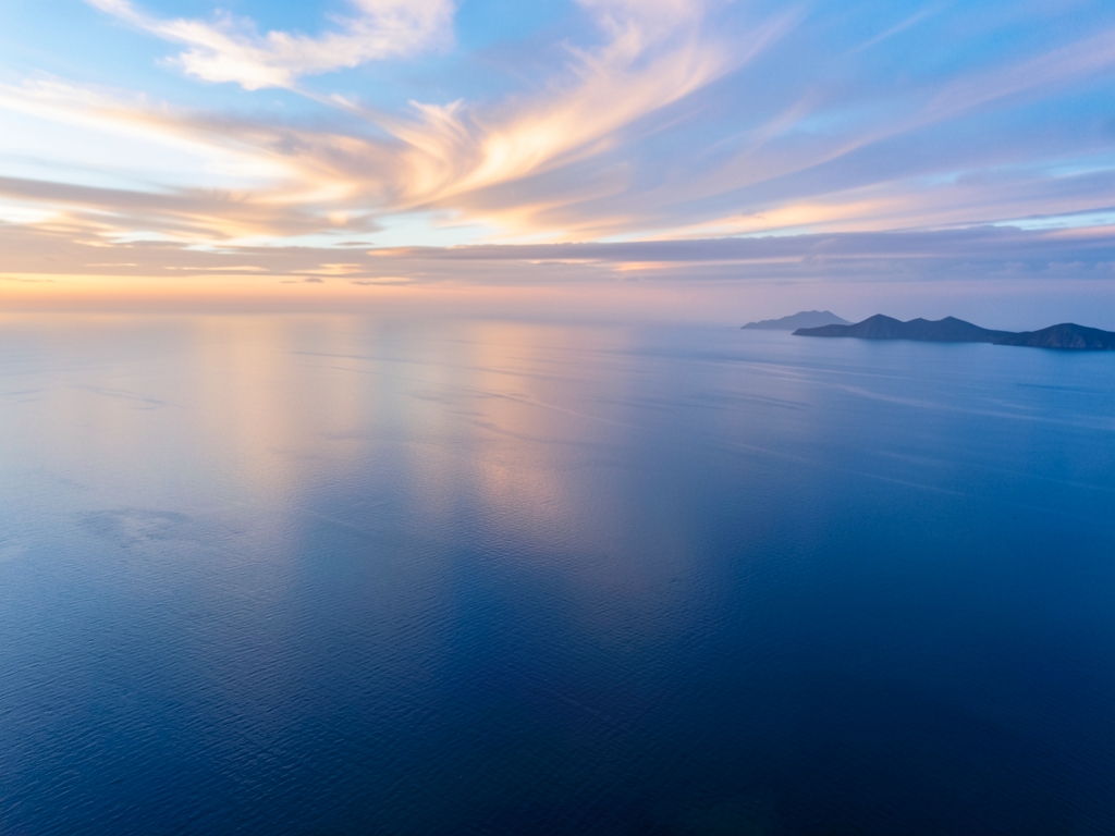 sweeping view high above northern Pacific twilight with