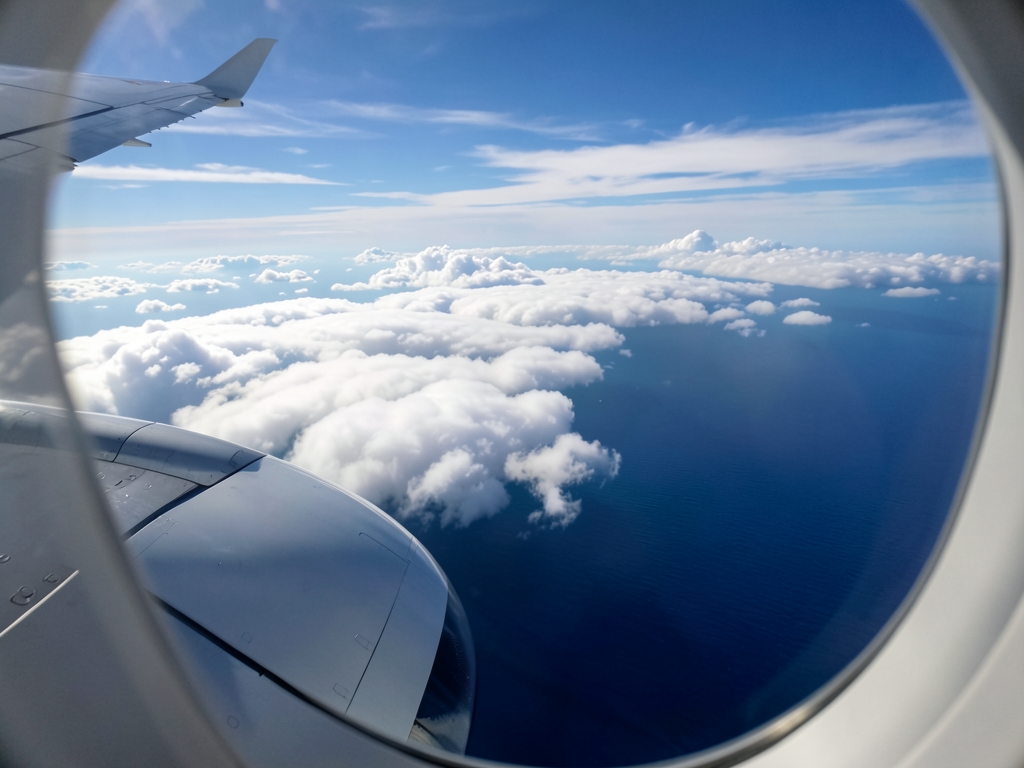 Ethereal view from airplane window looking down swirling