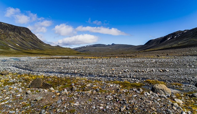 landscape mountain river delta sky nature clouds veodalen jotunheimen norway stone