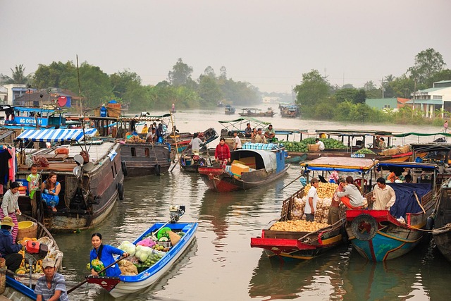 floating market on the river culture traditional the mekong delta river buy sale work crowded bustle vietnam women man f