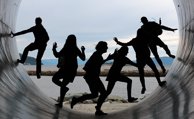 friendship fun backlighting together characters nature people tube fjord water sky blue outlines the shade running to da