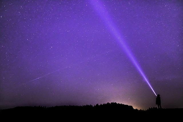 night photograph nature flashlight ray starry sky night sky star night sky human person long exposure evening sky cosmos