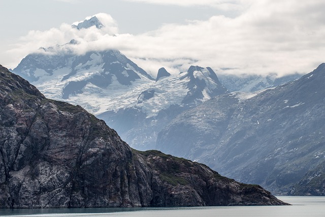 mountain peak glacier alaska landscape scenery nature summit sky scenic snow outdoor adventure rock cliff alaska alaska