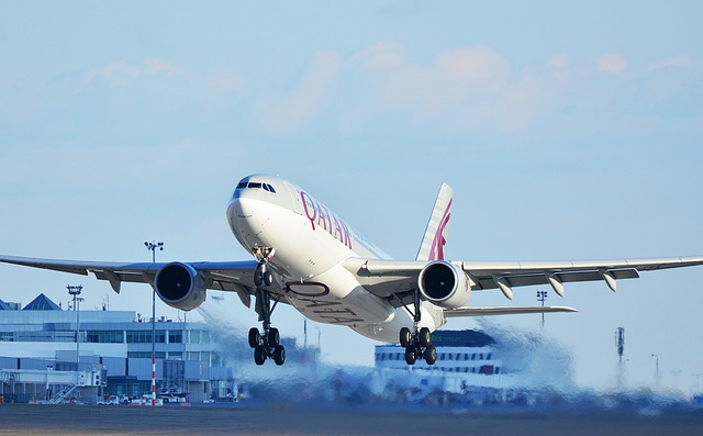 Points vs cash: options compared — Business class to Doha
