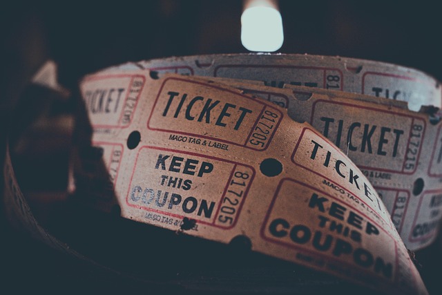 ticket coupon admission carnival circus concert entertainment event fare movie roll show theater cinema closeup ticket t