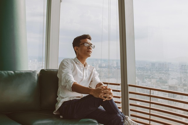 man seat thinking mood setting on high