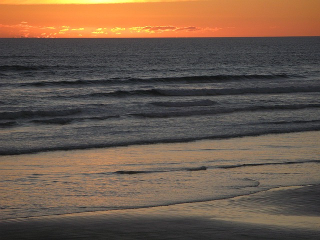 sunset ninety mile beach beach new zealand orange nature sky evening