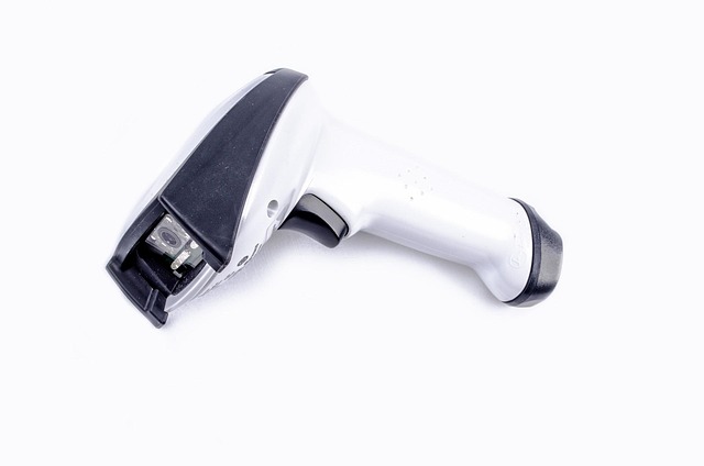 scanner reader code wireless scan bluetooth hand isolated numbers cash desk display white bar retail warehouse business 