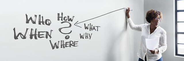 business office training problem solution ask who how what where when why woman lecturer presentation whiteboard board w
