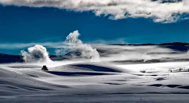 yellowstone national park snow fields hoarfrost snow fields smoke wyoming snowy snowscape winterscape wintry sky clouds