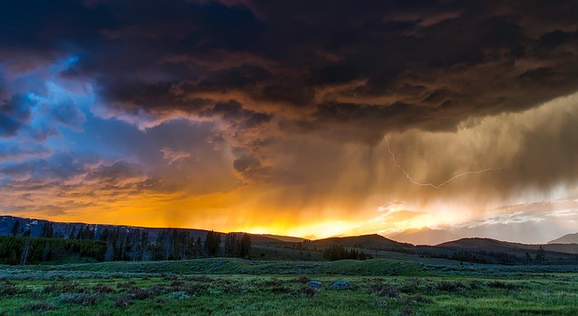 fields clouds mountains mountainous meadow prairie yellowstone national park wyoming landscape scenic wilderness forest
